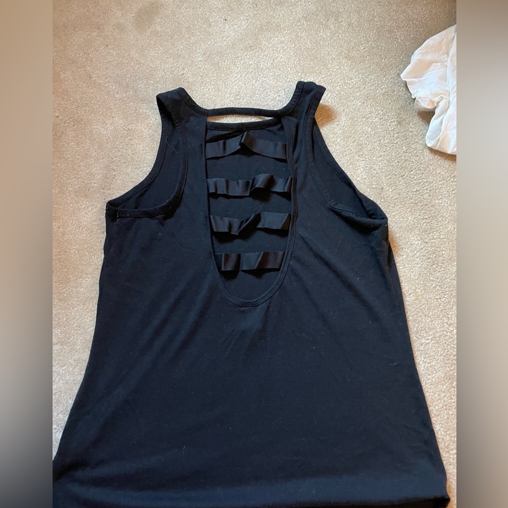 I am selling a black athletic tank top. It is a size medium.